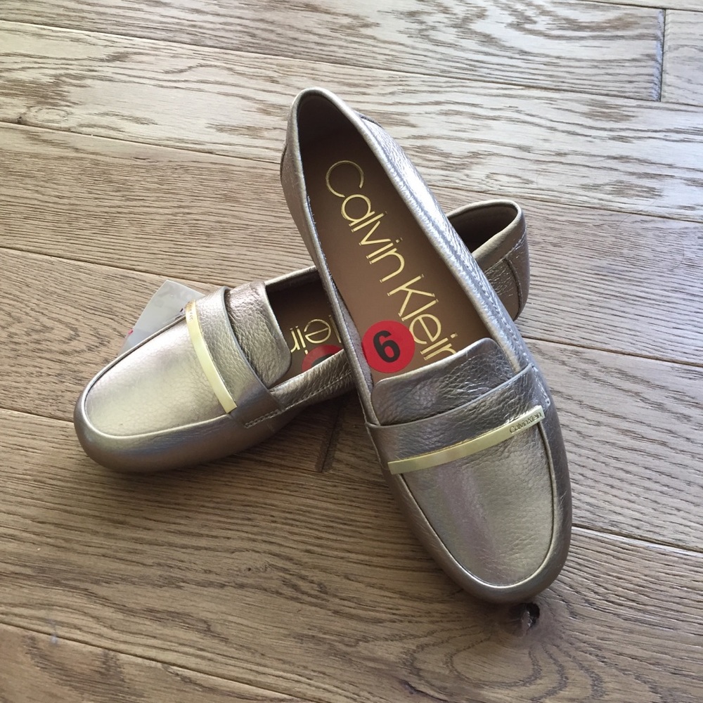 NEW Calvin Klein Gold leather loafers